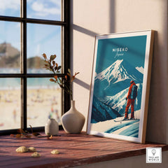 Niseko Wall Art Japan Ski Poster displayed near a window with mountain view, showcasing winter sports and travel art.