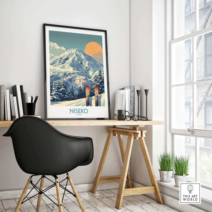 Modern room with Niseko Wall Art Ski Poster featuring snowy mountain and skis, framed on a desk with books and decor.