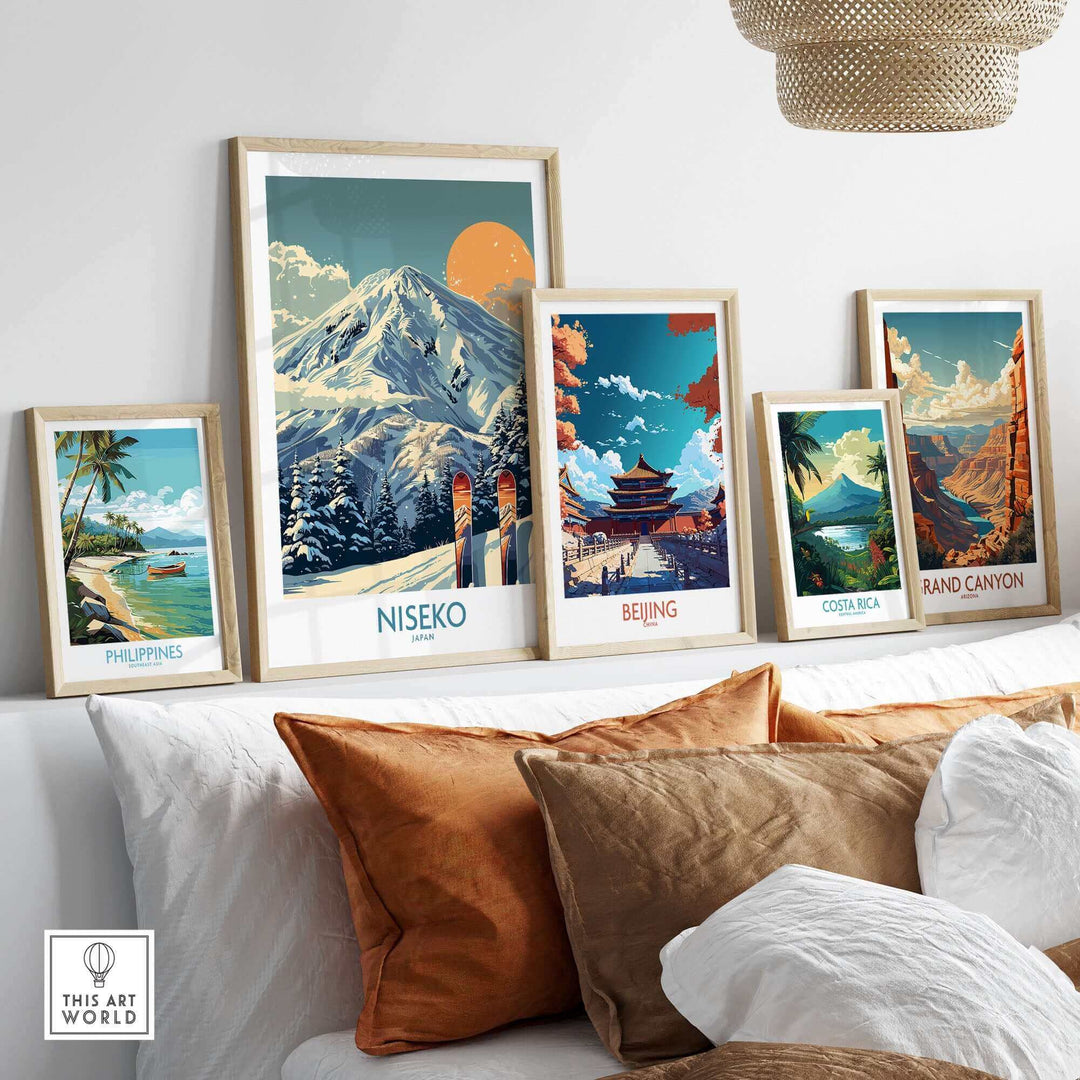 Stylish room with framed Niseko ski poster and various travel-themed wall art, enhancing home decor.