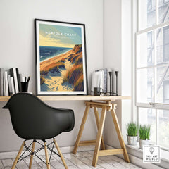 Norfolk Coast Poster Print showcasing serene coastal scenery in a stylish workspace with natural light.