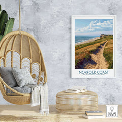 Norfolk Coast Print displayed in a cozy setting with a hanging chair and decorative elements.