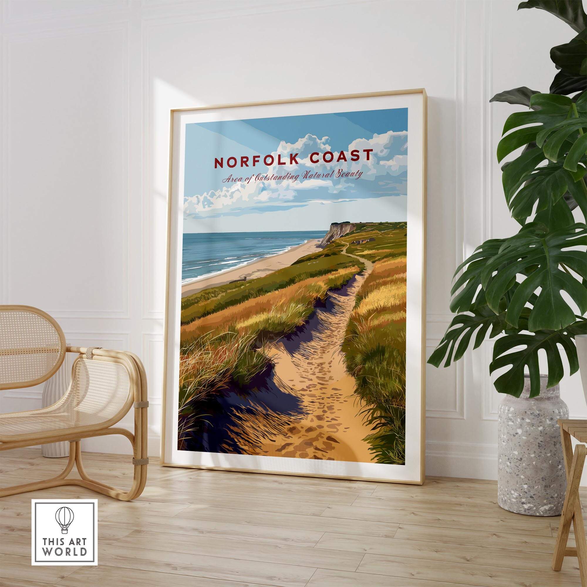 Norfolk Coast Travel Poster featuring stunning coastal views and grassy paths in a stylish home setting.