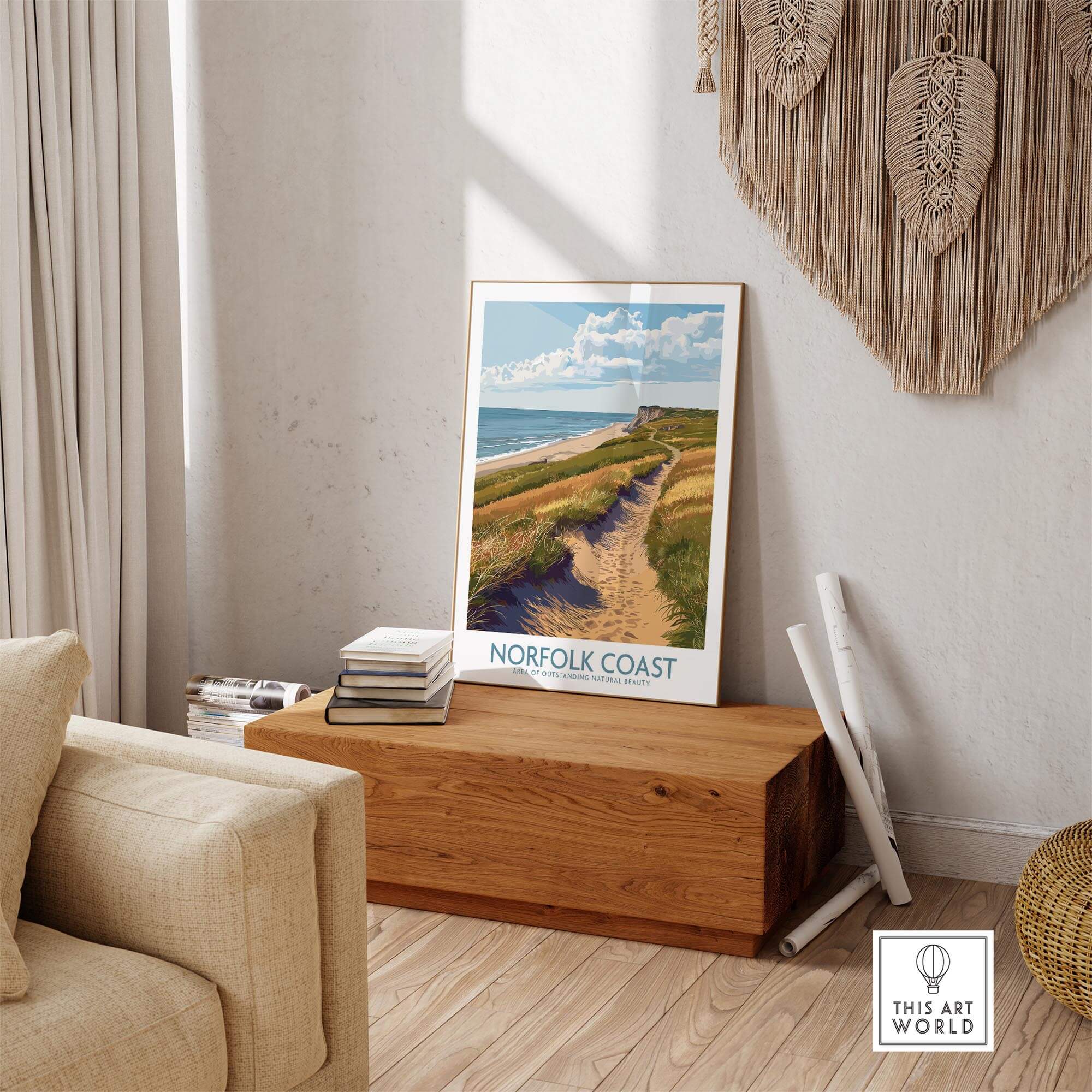 Norfolk Coast Travel Print showcasing a coastal landscape in a light-filled modern interior.