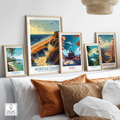 Norfolk Coast Wall Art Print among various travel destination artworks in a home decor setting.