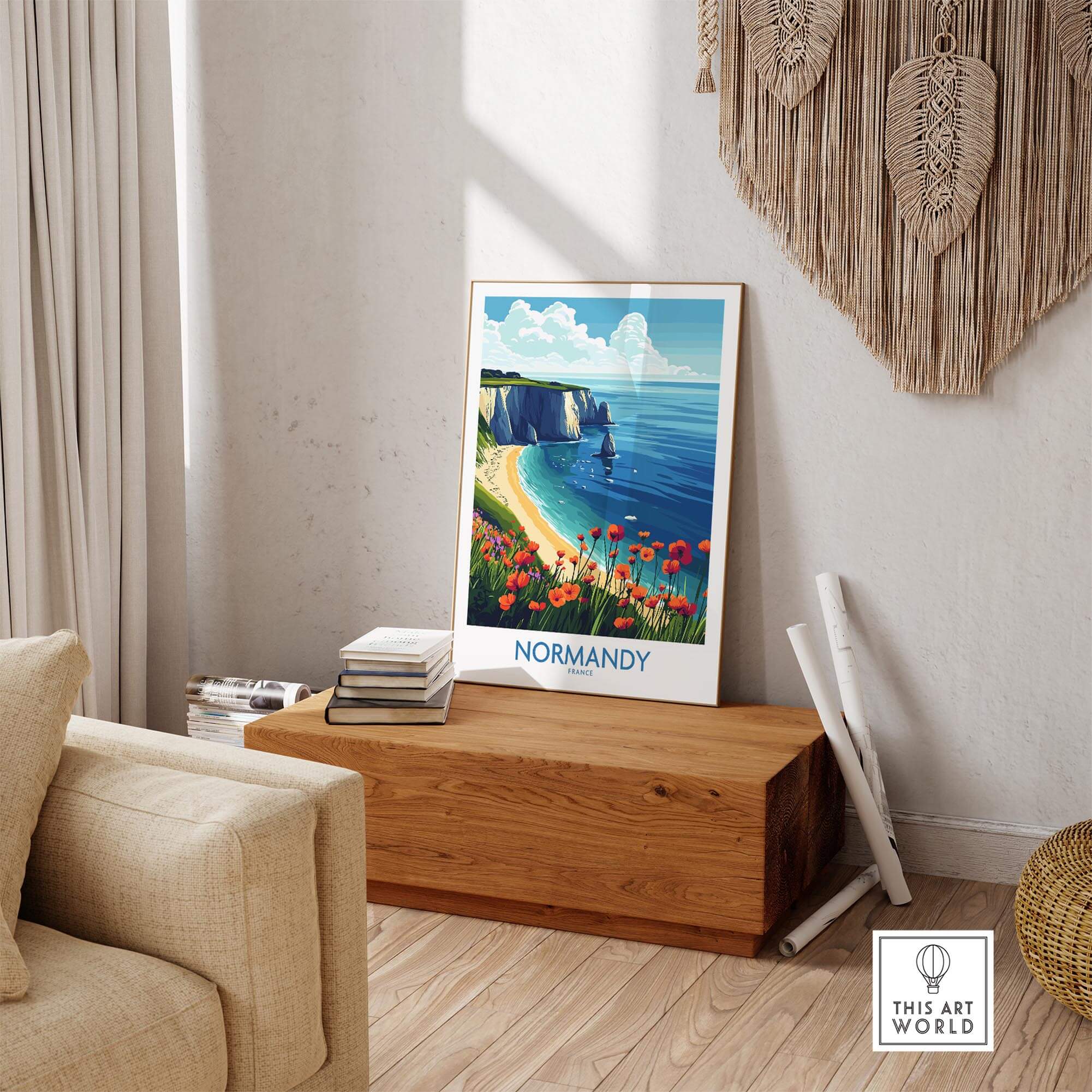 Normandy Poster France displayed in a cozy living room, showcasing vibrant coastal scenery and flowers.