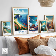 Normandy Poster France showcased among vibrant travel posters on a stylish wall display for art lovers.