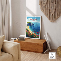 Normandy Print France featuring the picturesque coast and vibrant flowers in a stylish home setting.