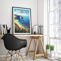 Normandy Print France artwork showcasing coastal scenery and vibrant flowers in a stylish home office.