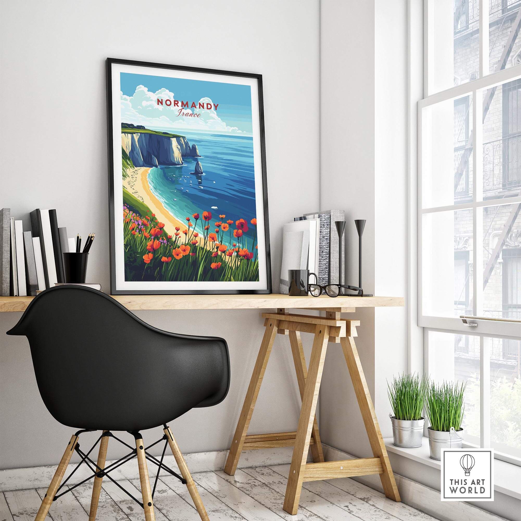 Normandy Print France artwork showcasing coastal scenery and vibrant flowers in a stylish home office.