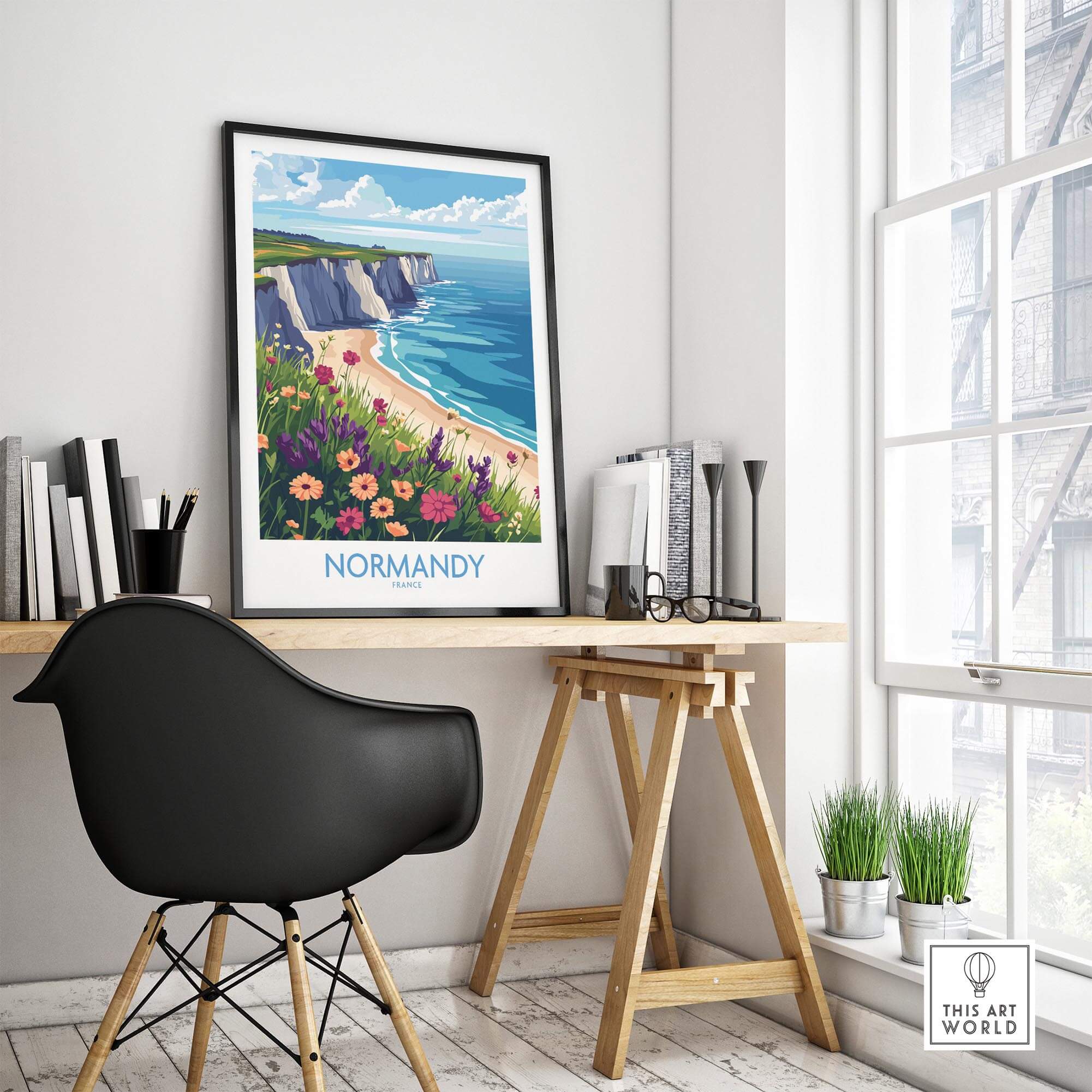 Normandy Travel Poster showcasing a beautiful coastal scene and vibrant flowers in a stylish home office setting.