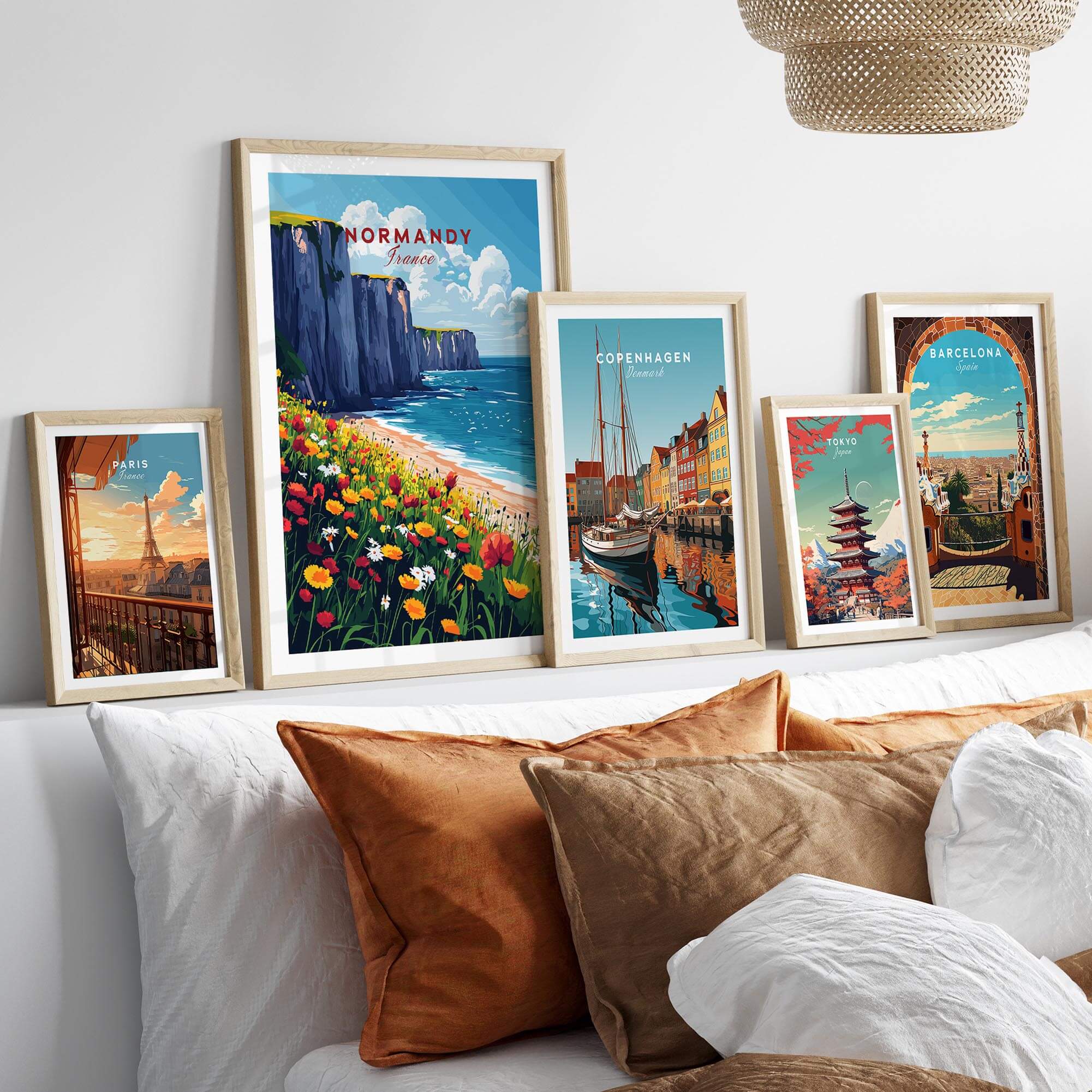 Normandy Wall Art Print and other travel posters displayed in a stylish home decor setting.