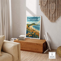 Northumberland Coast Print displayed in a stylish home interior, showcasing stunning coastal scenery.