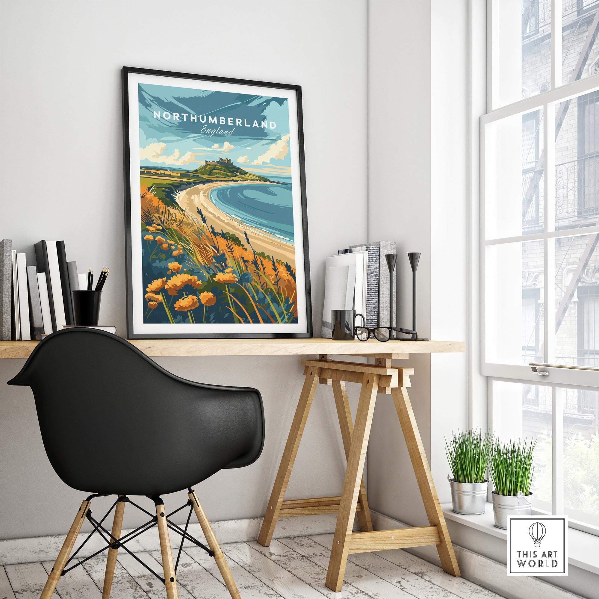 Northumberland Coast Print displayed in a modern workspace, showcasing the stunning Northumberland coastal scenery.