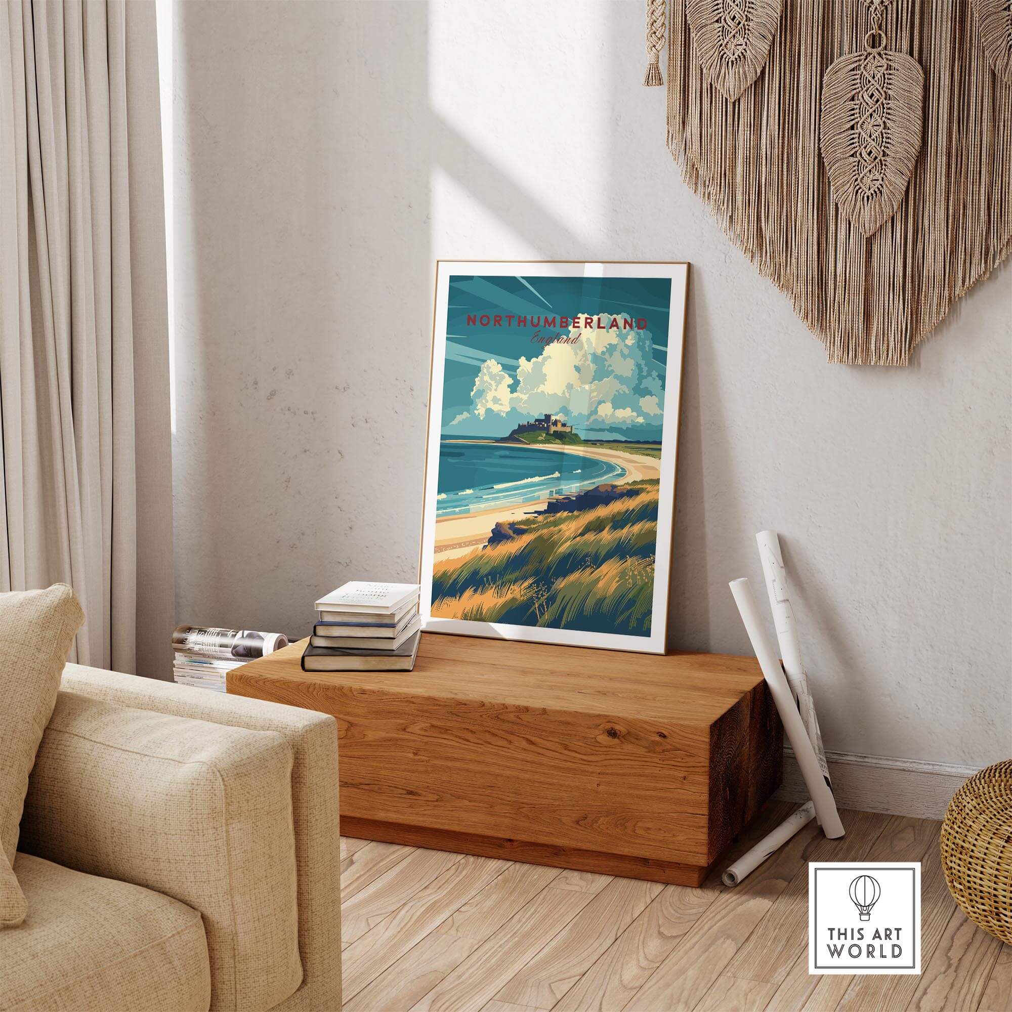 Northumberland Coast Travel Print displayed in a cozy living room with natural decor and sunlight.