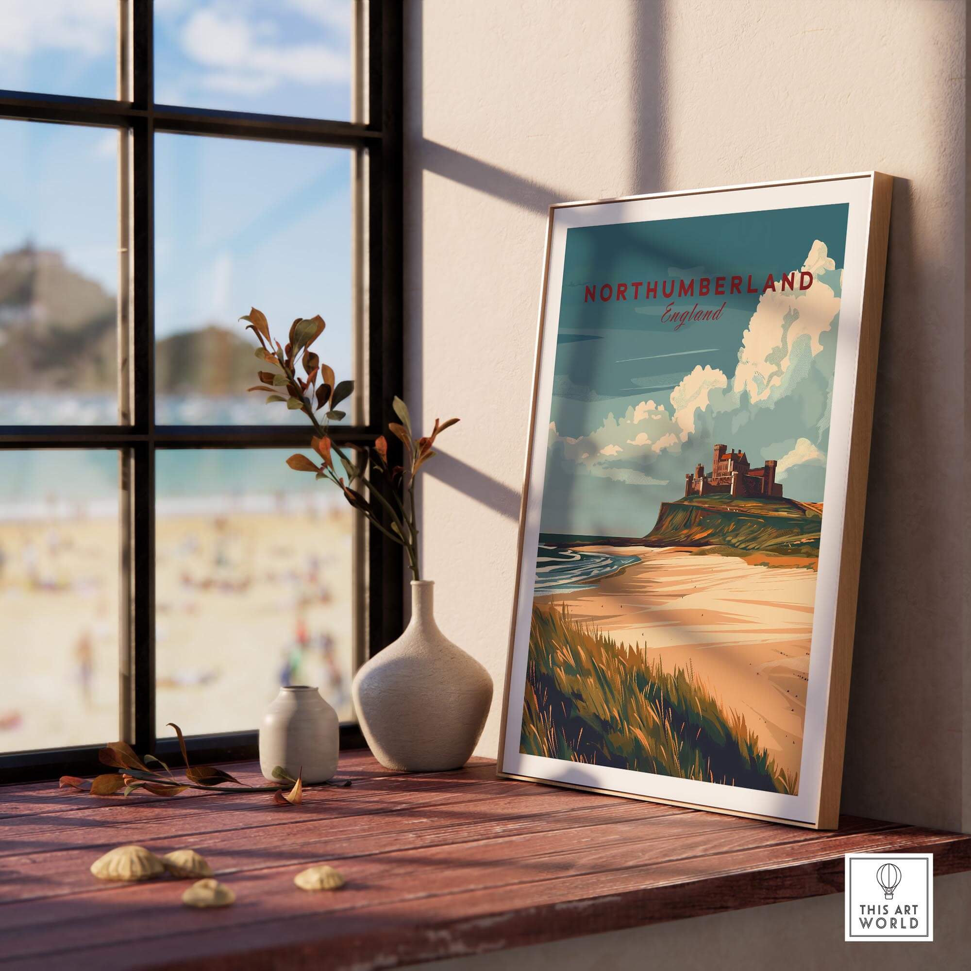 Northumberland Wall Art Print - Bamburgh Castle displayed in a sunny room with beach view, enhancing home decor.