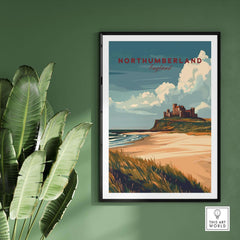 Northumberland Wall Art Print - Bamburgh Castle displayed in a stylish frame against a green wall.