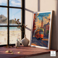 Novi Sad Travel Print - Serbia showcasing a colorful tram and beautiful architecture in a bright room setting.