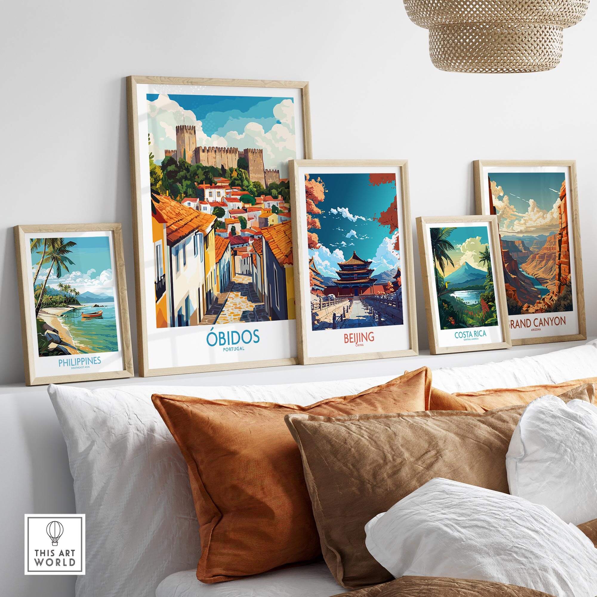 Obidos Portugal Wall Art Print displayed among other vibrant travel posters in a stylish home decor setting.