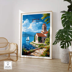 Ohrid Wall Art featuring a serene lake and a beautiful church under a blue sky, enhancing home decor and artistic flair.