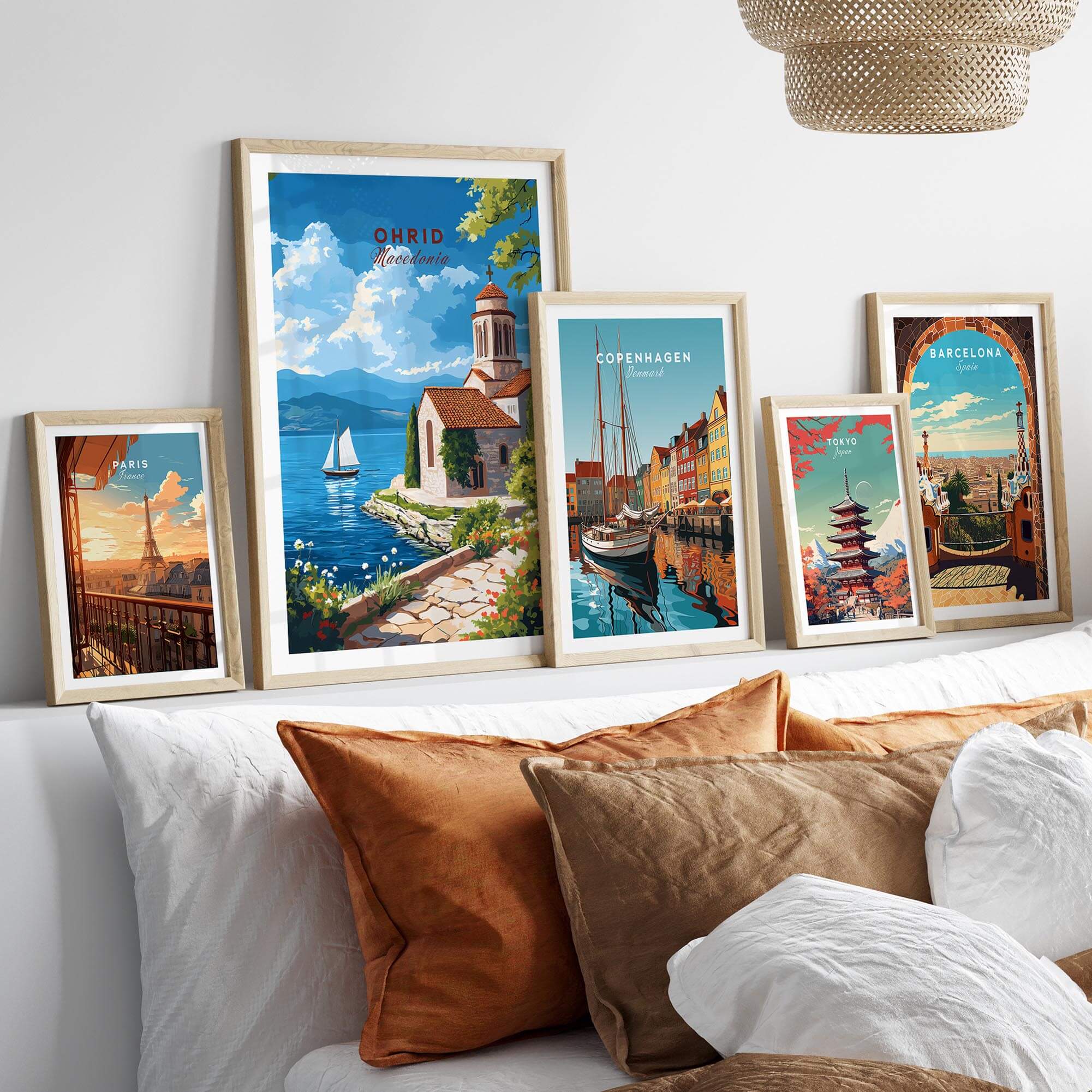 Ohrid Wall Art displayed on a stylish wall above a couch with decorative pillows.