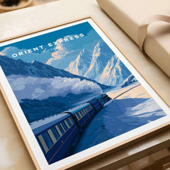Orient Express Luxury Rail Mountain Scenery Print | Vintage Travel Wall Art in a framed setting, showcasing picturesque train and mountains.