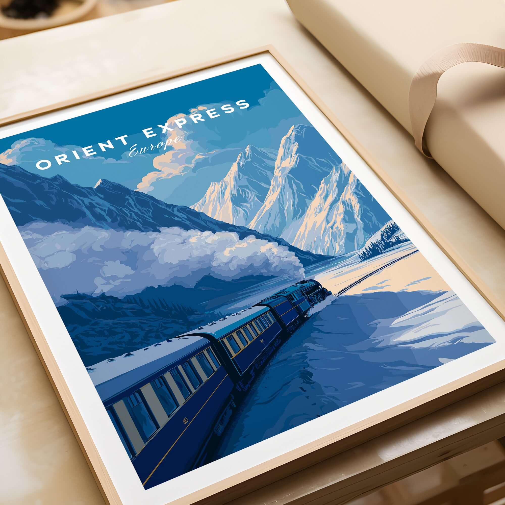 Orient Express Luxury Rail Mountain Scenery Print | Vintage Travel Wall Art in a framed setting, showcasing picturesque train and mountains.