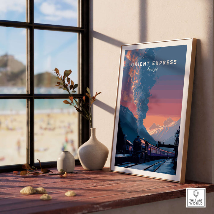 Orient Express Poster Luxury Rail Travel Poster displayed in a chic interior setting with a beach view.