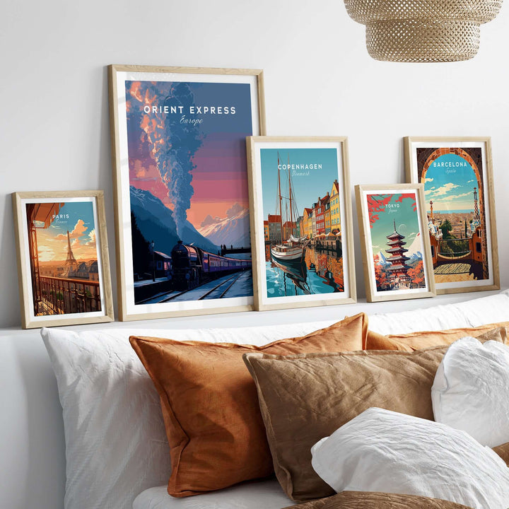 Orient Express Poster Luxury Rail Travel Poster displayed among framed travel posters on a stylish wall.