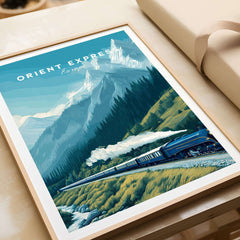 Orient Express Poster | Luxury Travel Wall Art featuring a vintage train against a mountain backdrop.
