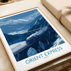 Orient Express Print | Snowy Mountain Poster featuring a train crossing a picturesque snowy landscape.
