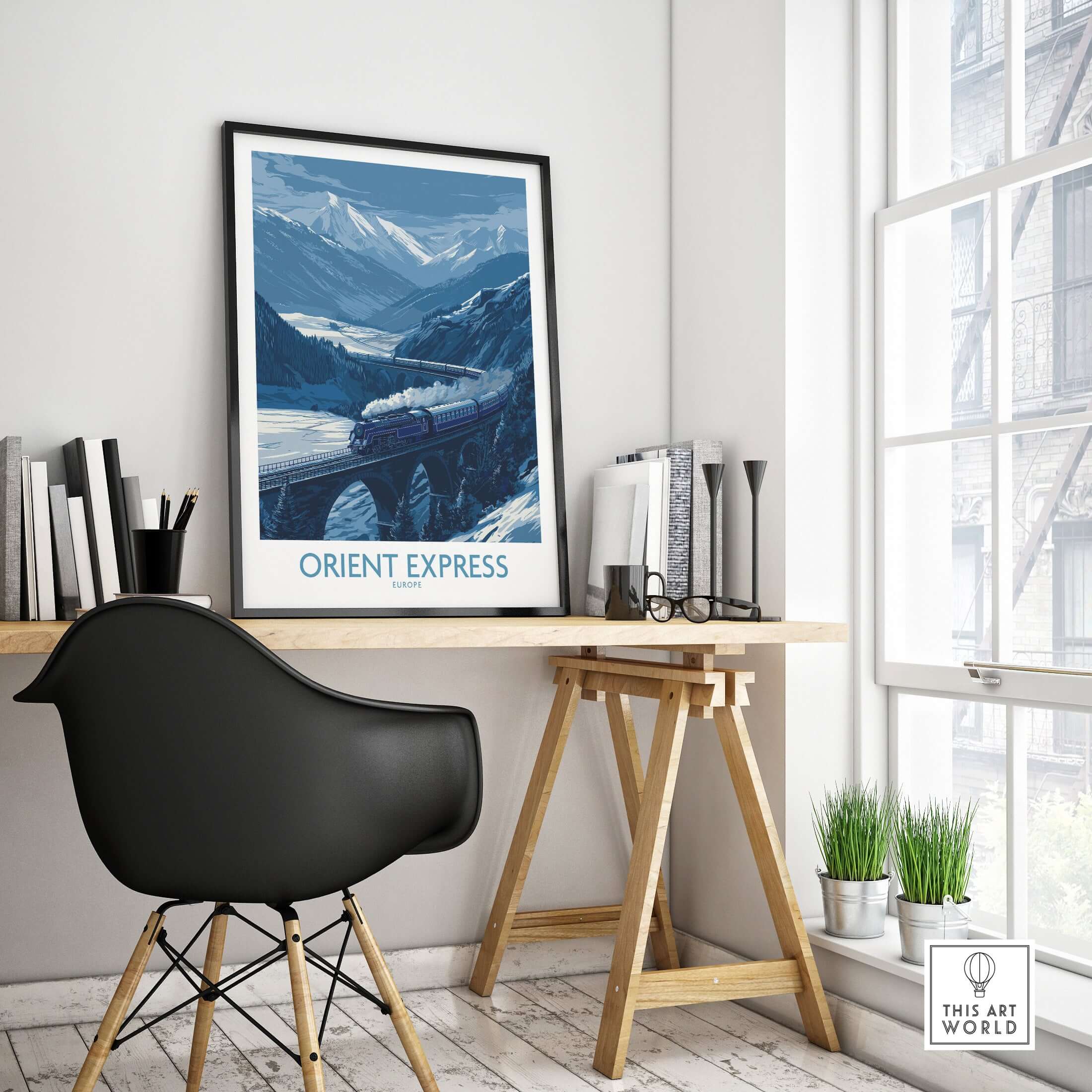 Orient Express Print | Snowy Mountain Poster displayed in a stylish workspace with snowy mountain backdrop.