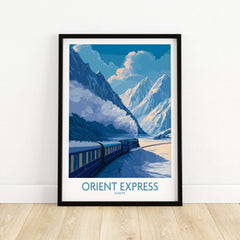 Orient Express Train Print | Snowy Alps Journey Poster featuring a scenic winter landscape with mountains.