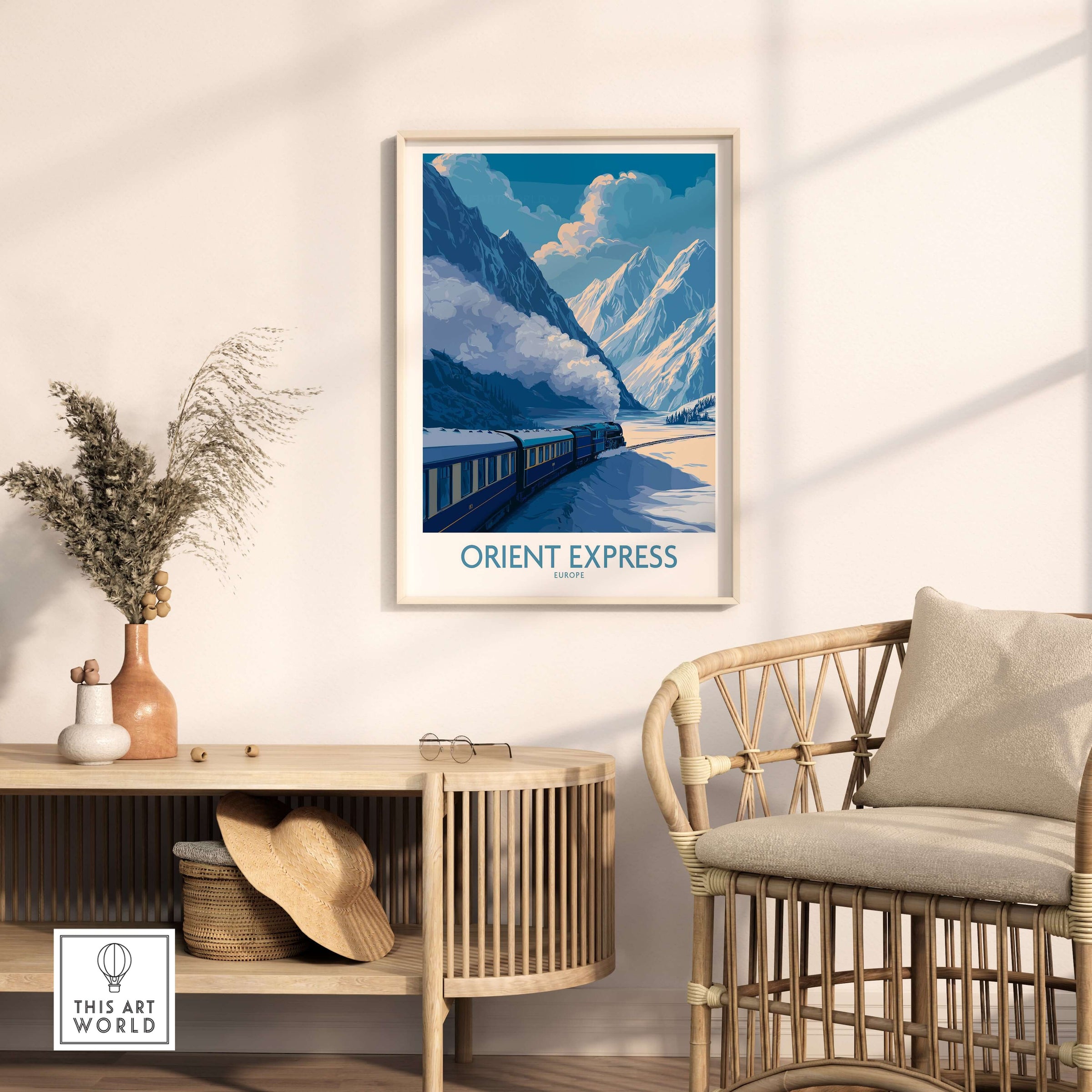 Orient Express Train Print | Snowy Alps Journey Poster displayed in a cozy interior setting with mountains in the background.