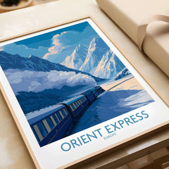 Orient Express Train Print | Snowy Alps Journey Poster showcasing a train against the snowy mountains and blue sky.