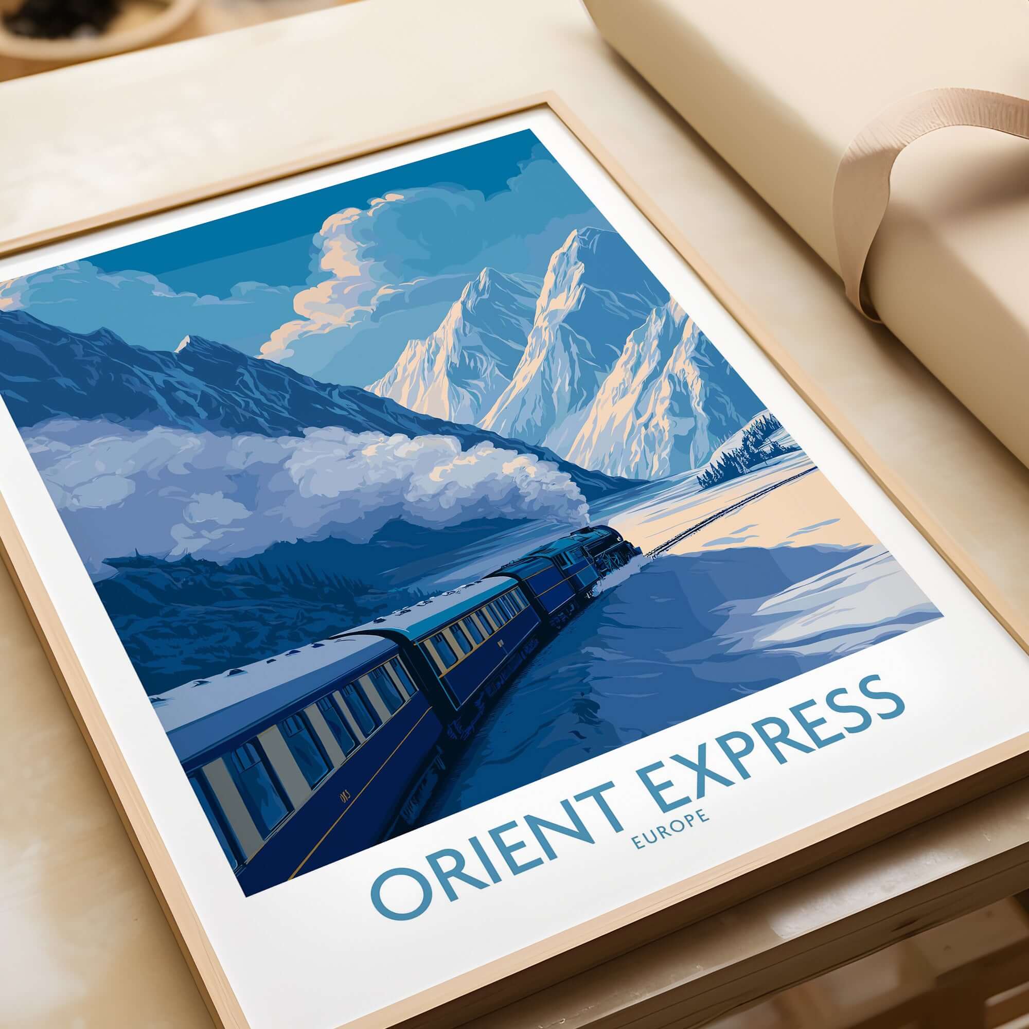Orient Express Train Print | Snowy Alps Journey Poster showcasing a train against the snowy mountains and blue sky.