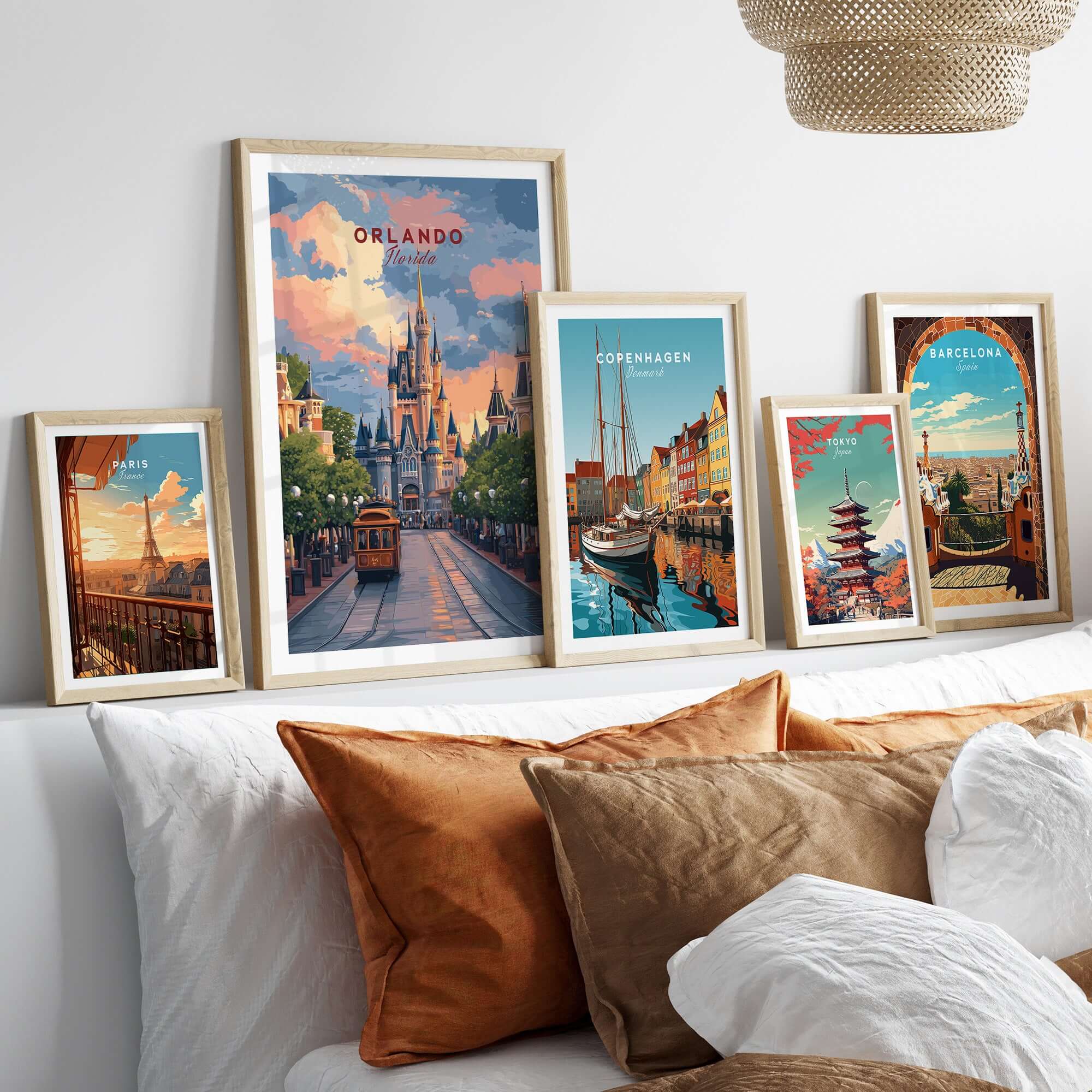 Orlando Print | Florida Home Decor showcased in a stylish arrangement of framed artworks on a couch.