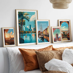Orlando Print | Florida City Wall Art displayed in stylish frames above a cozy sofa, showcasing vibrant city scenes.