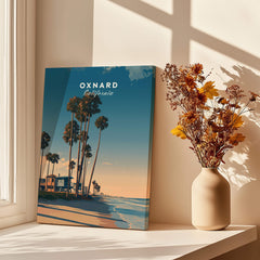 Oxnard California Wall Art Print | Pacific Coast Palms Travel Poster displayed near a vase with flowers.