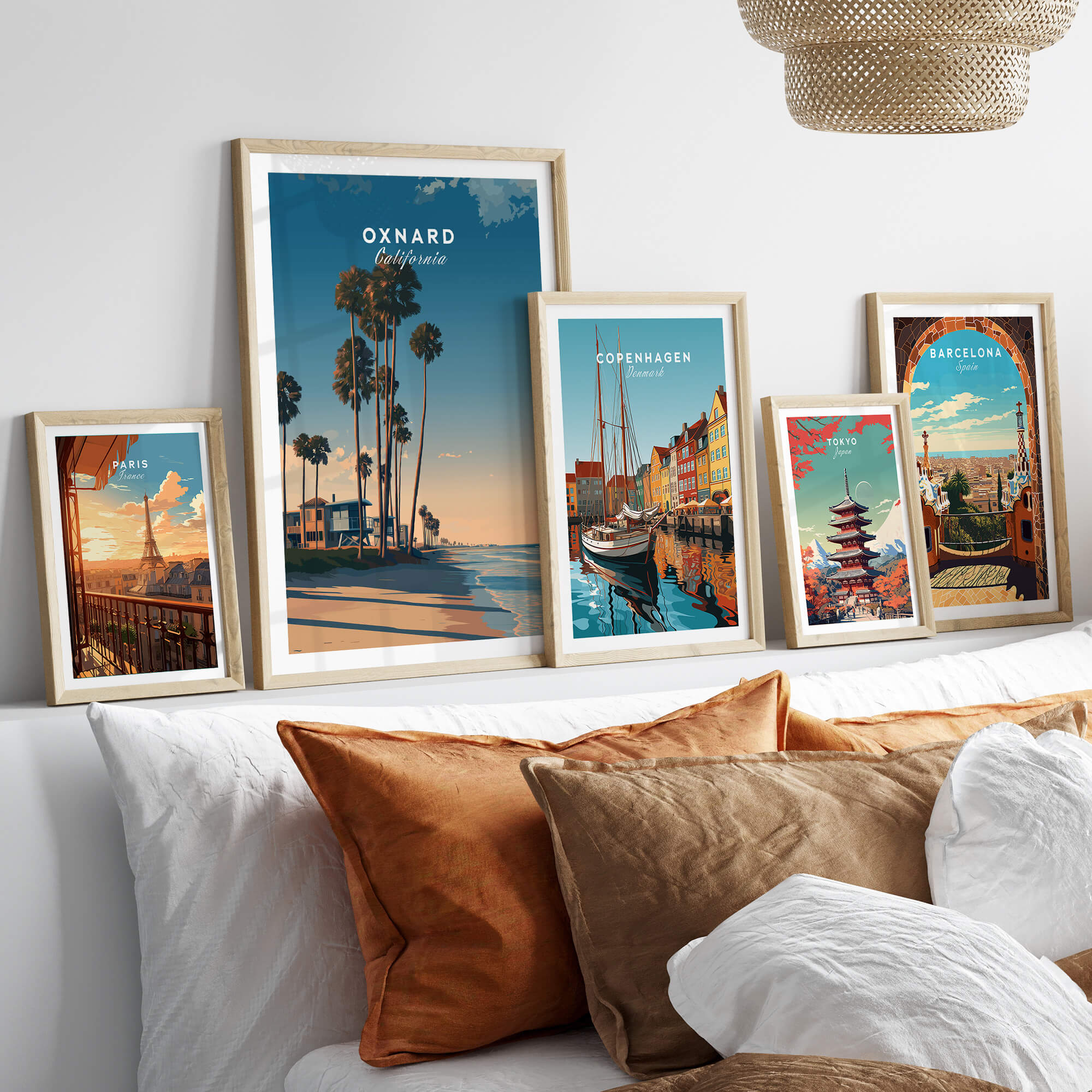 Oxnard California Wall Art Print | Pacific Coast Palms Travel Poster displayed in stylish frames on a bed.