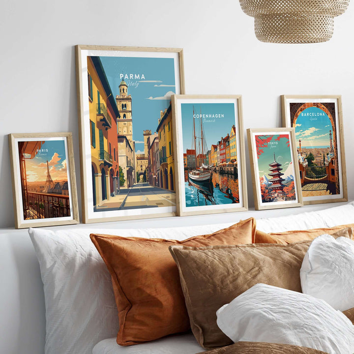Parma art print and cityscape posters in stylish frames, enhancing minimalist decor on a cozy sofa.
