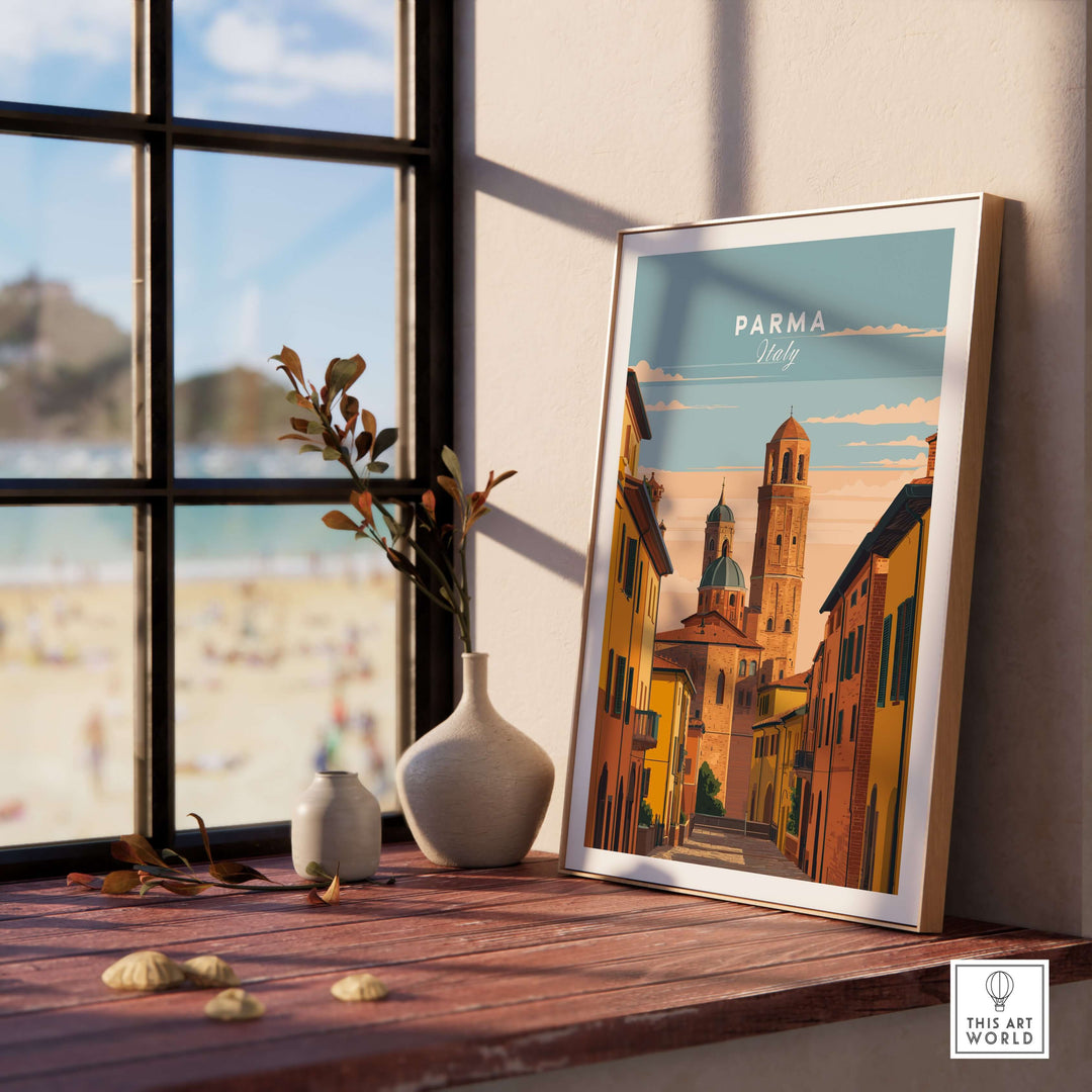 Parma art print displayed on a wooden table beside a window, featuring an Italian street scene in vibrant colors.