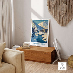 Pas de la Casa Andorra Art Print | Winter Village Bridge Poster displayed in a cozy living room setting.