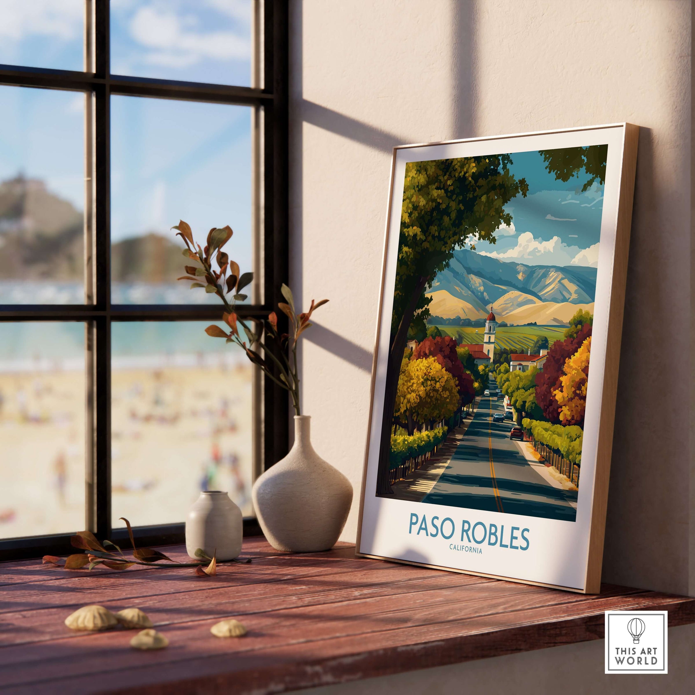Paso Robles California Wine Country Art Print | Vineyard Travel Poster displayed on a wooden table near a window.