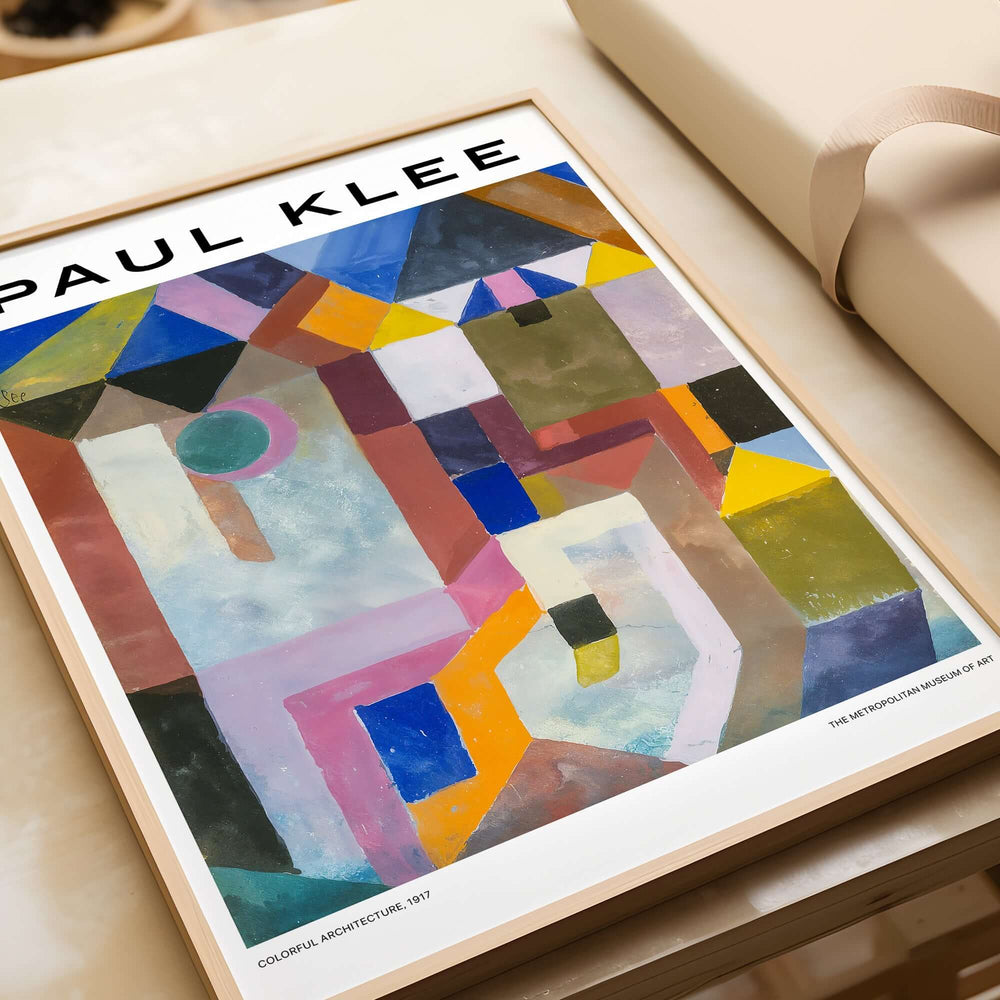 Paul Klee Colorful Architecture Abstract Geometric Poster Art Print Decor displayed on a table with packaging.