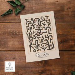 Paul Klee Comedians Handbill Abstract Figures Poster Modern Art Print featuring whimsical figures and shapes on a wooden background.