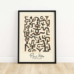 Paul Klee Comedians Handbill Abstract Figures Poster Modern Art Print in a black frame on a wooden floor.