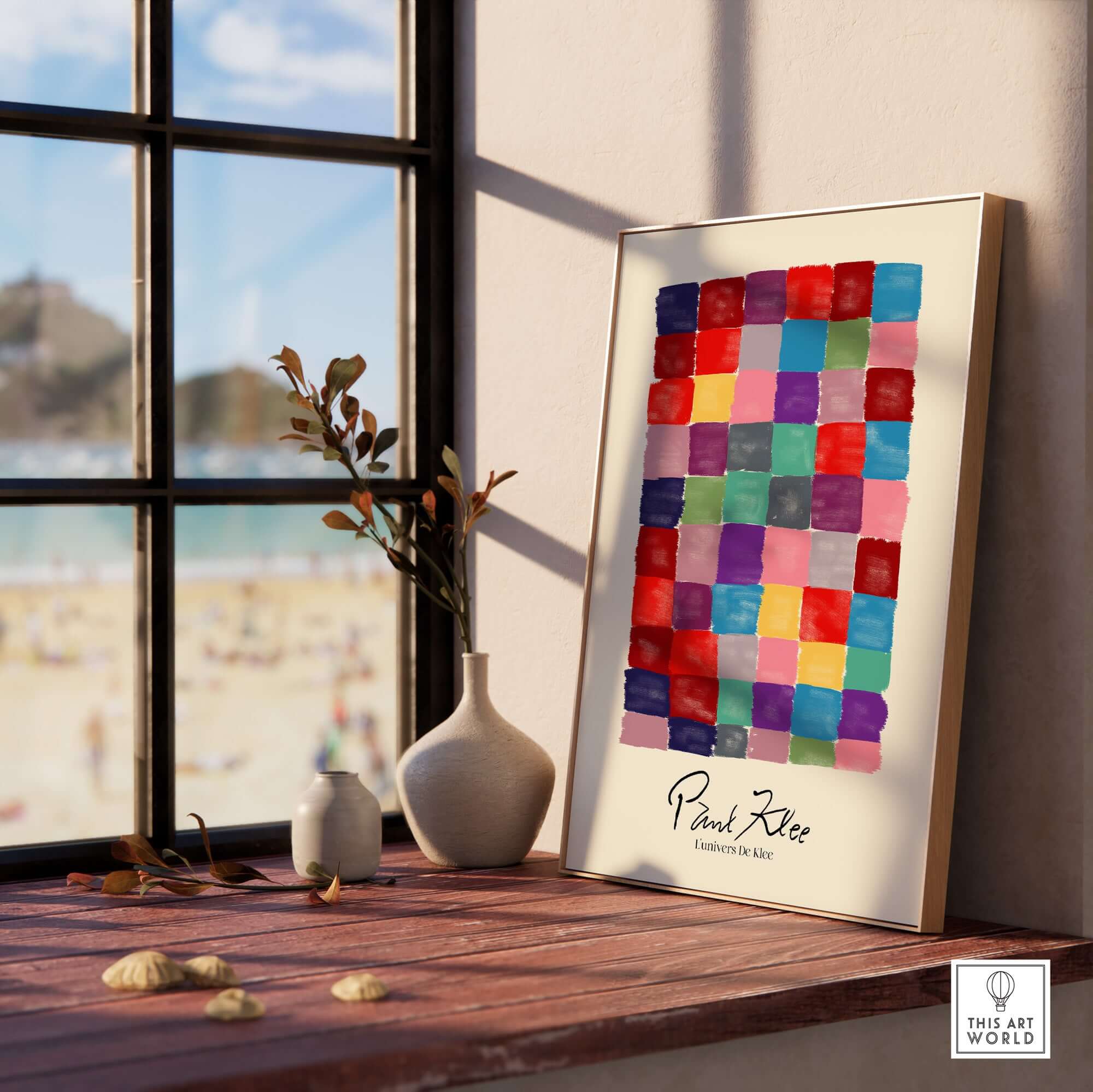 Paul Klee L univers De Klee Colorful Squares Abstract Grid Poster Art Print displayed on a wooden table near a window.