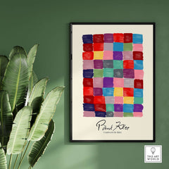 Paul Klee L univers De Klee Colorful Squares Abstract Grid Poster Art Print displayed in a stylish frame and green wall.
