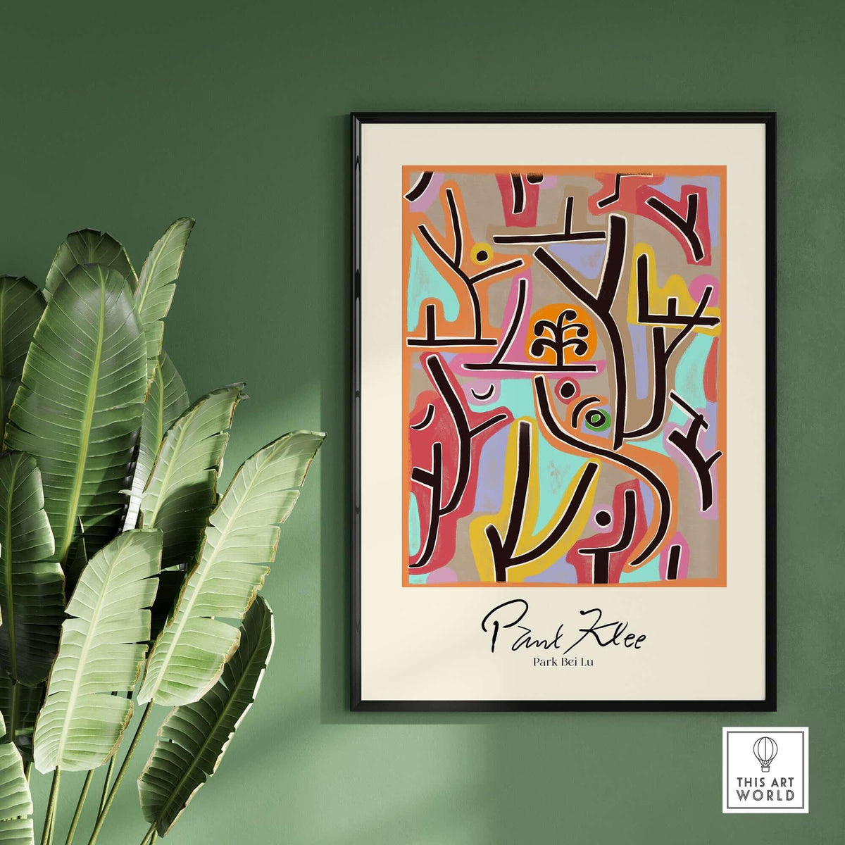 Paul Klee Park Bei Lu Colorful Abstract Landscape Poster Art Print framed on a wall with green background and plants.