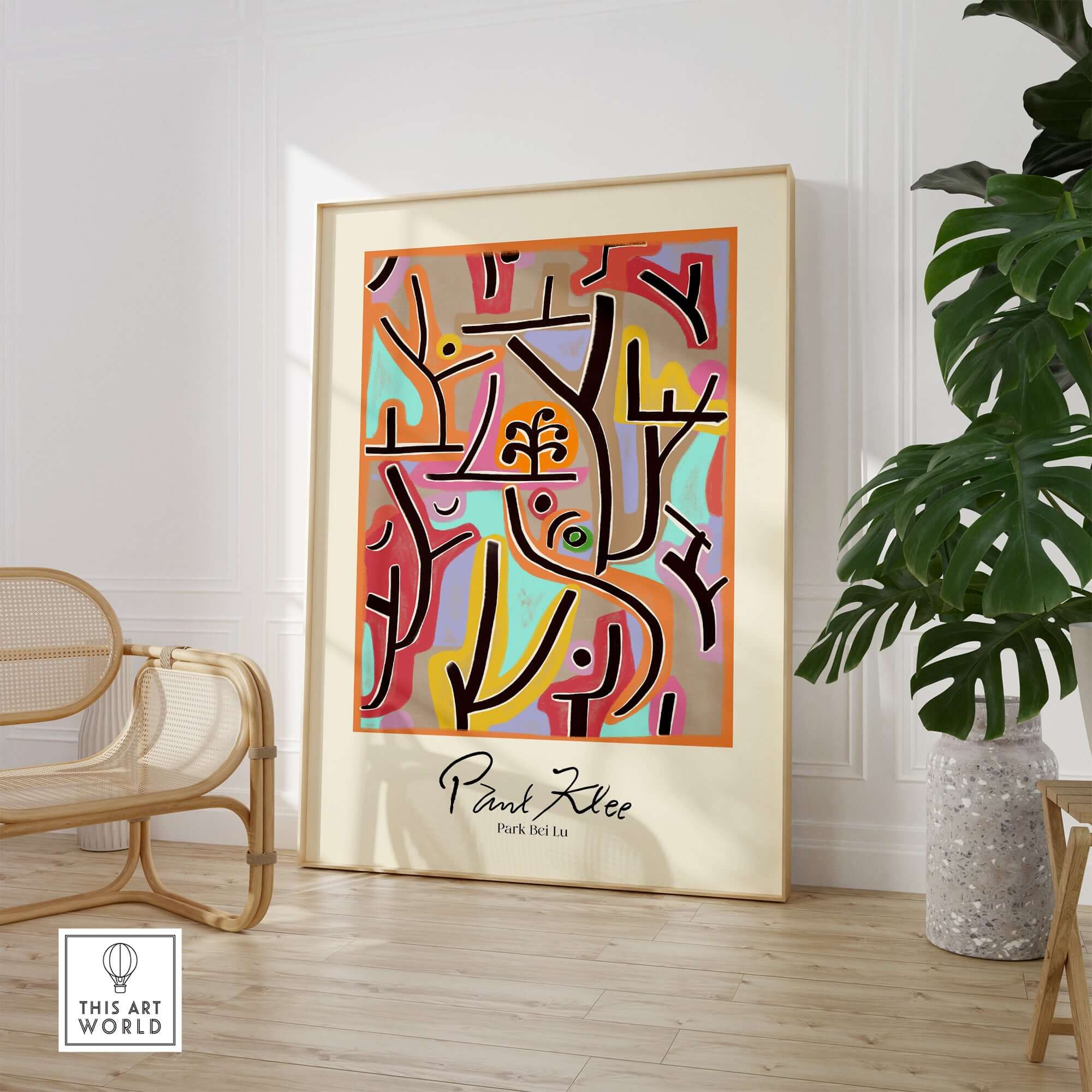 Paul Klee Park Bei Lu Colorful Abstract Landscape Poster Art Print displayed in a modern interior with plants.